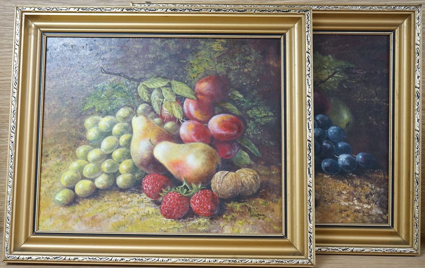 A Wilson, Still lifes of fruit, each signed, pair of oils on board, 24 x 29cm, gilt frames